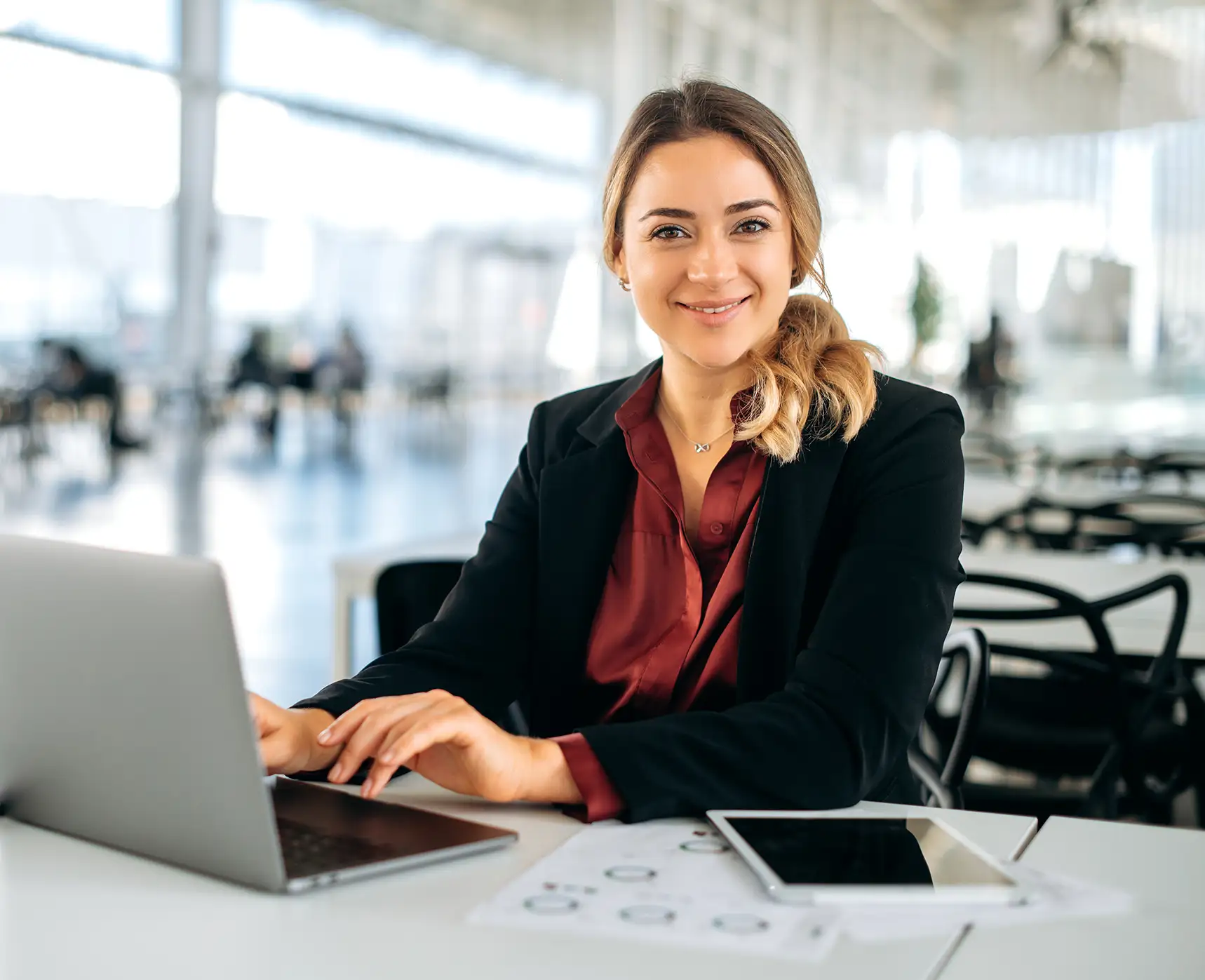 Business woman working on a laptop